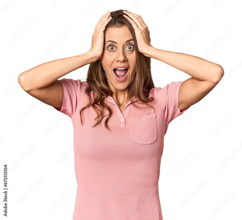 Middle-aged woman portrait in studio setting screaming, very excited, passionate, satisfied with something. Middle-aged woman portrait in studio setting screaming, very excited, passionate, satisfied with something.