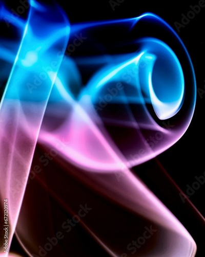 AI-generated illustration of an illuminated colorful abstract pattern on a dark background.