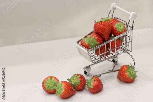 shopping cart with strawberry