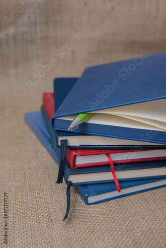 a ctack of notebooks folded on the table.education concept. close-up photo