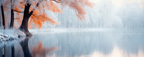 Beautiful autumn winter background, frozen lake and tree covered with snow with copy space
