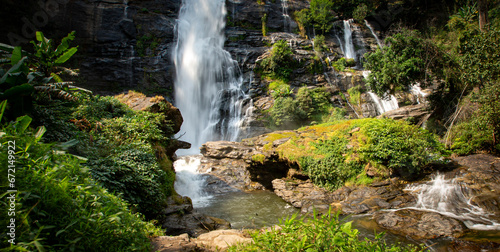 Wachirathan Waterfall in the forest  - Beautiful waterfall in the forest at Doi Inthanon National Park, Chiang Mai, Thailand photo