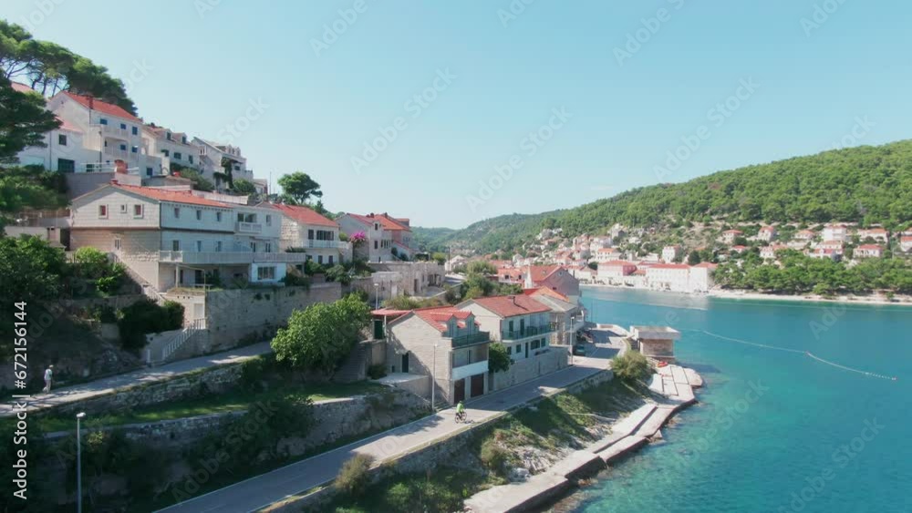 reveal of beautiful cityscape of Pucisca on the island of Brac in Croatia reveal of beautiful cityscape of Pucisca on the island of Brac in Croatia