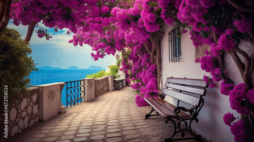 Vibrant purple flowers lining a walkway with bench