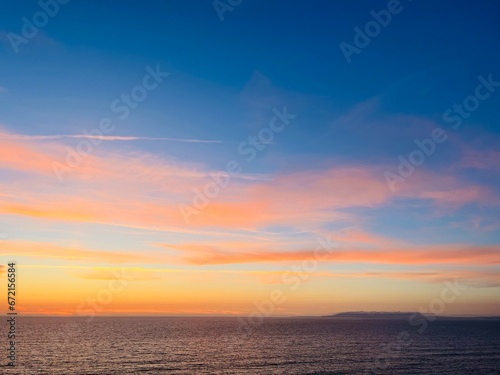 Beautiful colorful sky after the sunset at the sea coast  natural colors  sunset seascape background