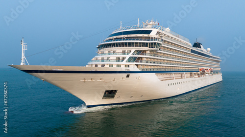 Cruise Ship  Cruise Liners beautiful white cruise ship above luxury cruise in the ocean sea concept exclusive tourism travel on holiday take a vacation time on summer.