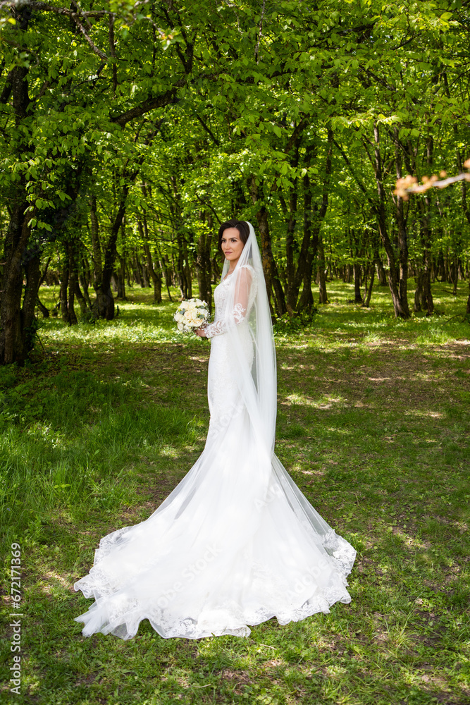 beautiful bride in gorgeous white wedding dress