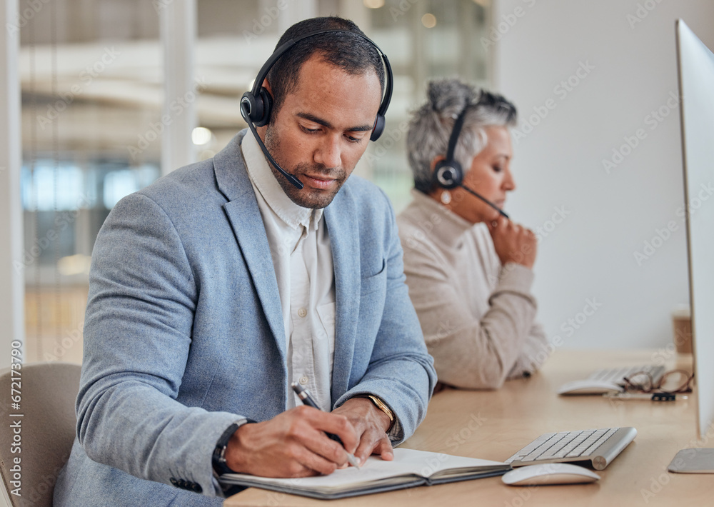 Call center, notebook or man writing in customer service help desk consulting for telemarketing in office. Businessman, notes or consultant planning a schedule or calendar reminder with headset Call center, notebook or man writing in customer service help desk consulting for telemarketing in office. Businessman, notes or consultant planning a schedule or calendar reminder with headset