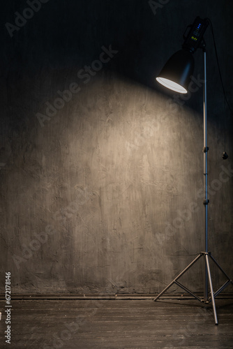 Photographer's Lighting Equipment in Photo Studio Light in the Dark
