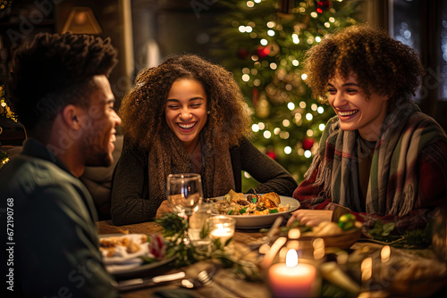Group of three friends or family celebrate Christmas dinner.