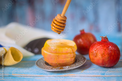 Holiday of rosh hashanah significance in jewish tradition symbols with apples, honey, pomegranate, Shofar photo