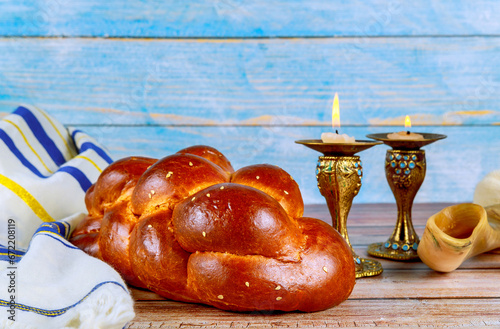 Sabbath serenity jewish holiday marked by homemade challah bread, kosher wine, candles