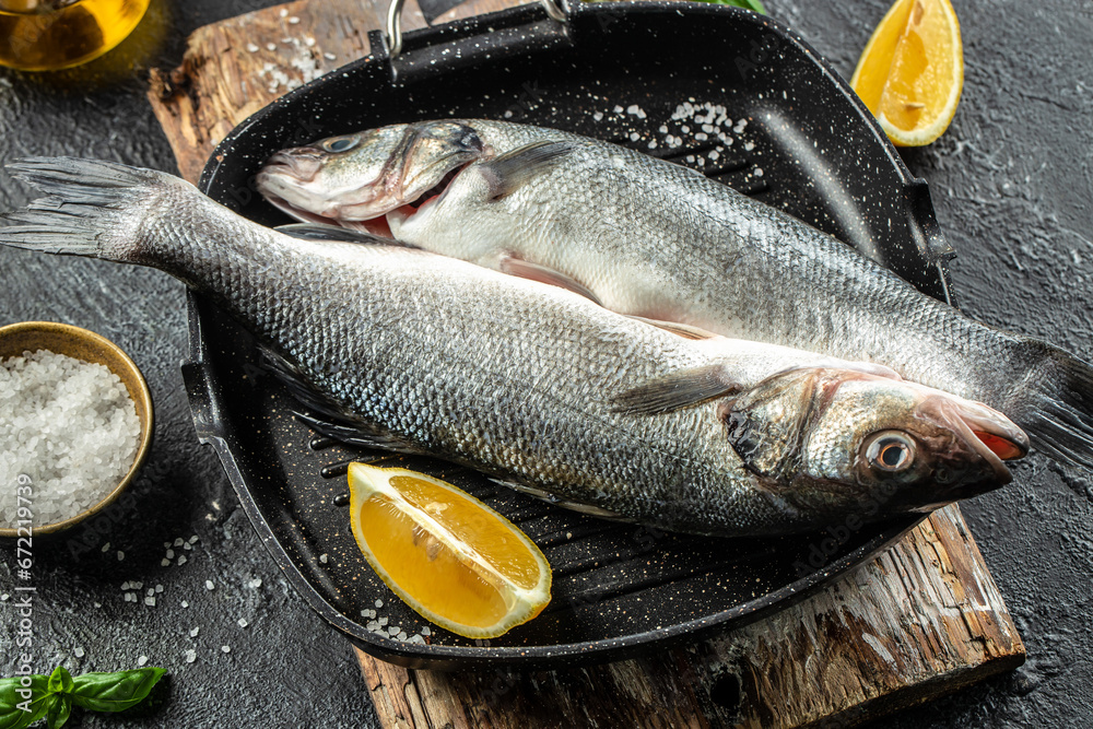 sea bass fish, Culinary seafood background. Restaurant menu, dieting, cookbook recipe top view