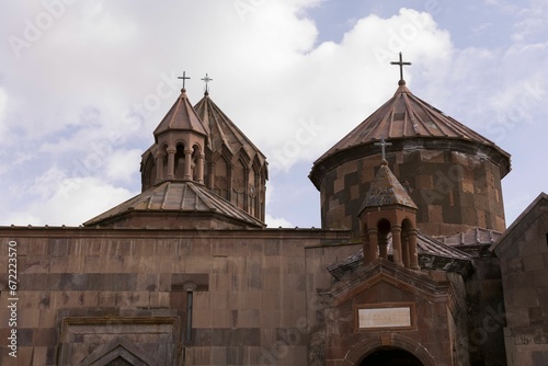 Old, ornately carved church in Armenia © Wirestock