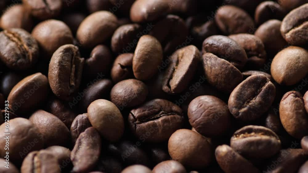 Shooting close to coffee beans. Coffee shop advertisement. Morning breakfast concept. Shooting close to coffee beans. Coffee shop advertisement. Morning breakfast concept.