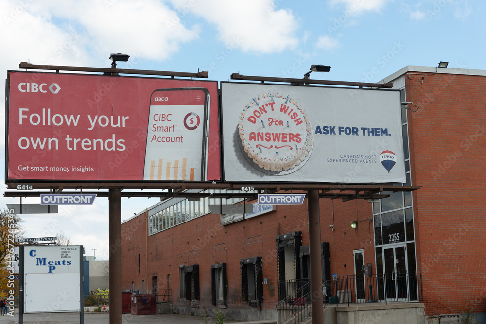 two billboards (one for CIBC and one for RE/MAX) located near CMP Meats ...