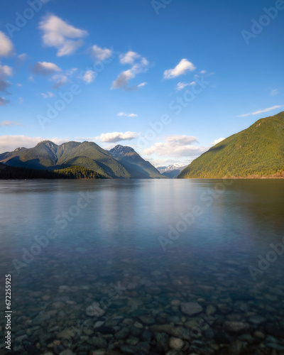 South Beach at Alouette Lake in Golden Ears Provincial Park, with shadows on the mountain peaks in the distance. Maple Ridge, British Columbia