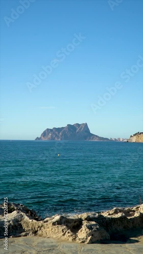 Mediterranean sea, Calpe rock over the horizon in the morning.