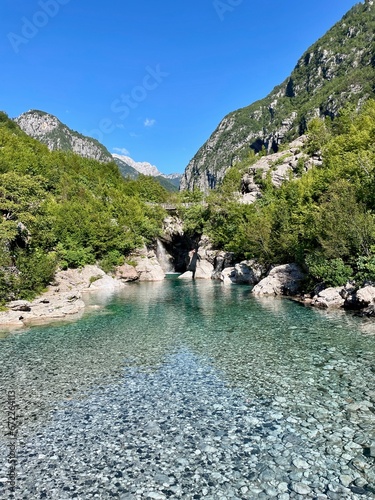 Pool with turquoise, crystal clear water on the way to Blue Eye Siri Kalter in Theth, Albanian Alps.