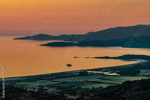 Fototapeta Naklejka Na Ścianę i Meble -  Sunset landscape with Plage du Sagnone, Corsica island, France