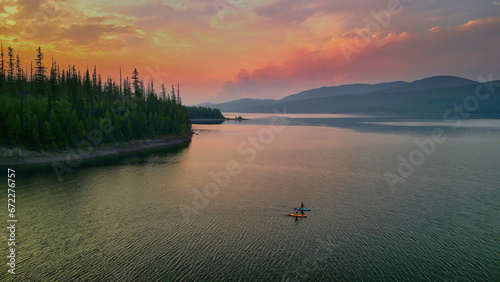 Aerial view of two paddleboarder on Hungry Horse Reservoir at su © Patrick Jennings