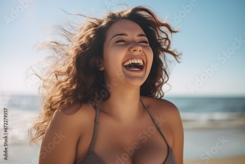 Young chubby black woman having fun at beach. Cheerful friends enjoying at sea. © Oulaphone