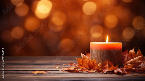  a lit candle with autumn leaves on a wooden table in front of a boke of lights.  generative ai © Shanti
