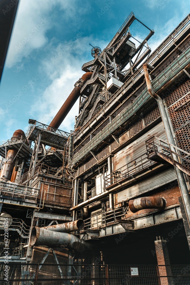 a view of the steel processing area outside a factory building a view of the steel processing area outside a factory building