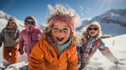 Group of friends having fun in the snow on a sunny day.