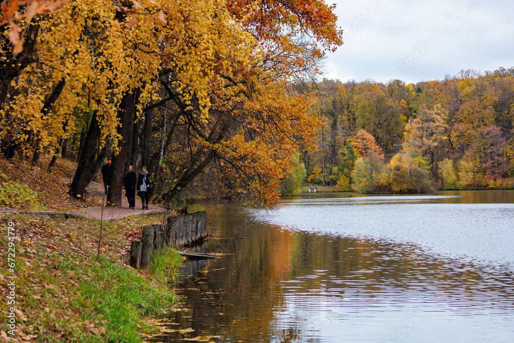 Autumn landscape with the image of a beautiful lake in the park Autumn landscape with the image of a beautiful lake in the park