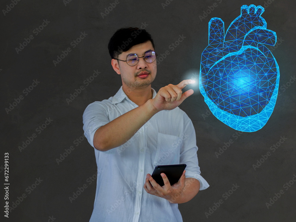 The doctor  look the heart  hologram,  checks the test result on the virtual interface and analyzes the data. Heart disease, MI, STEMI, heart attack, innovative technologies, medicine of the future.