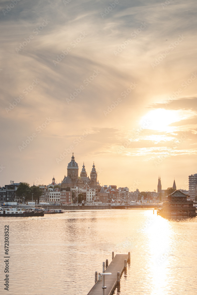 Downtown Amsterdam during a fabulous sunset. View from the NEMO museum. The Dutch capital. Venice of the North