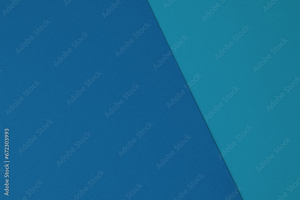 Paper background in two-tone blue colors. Blue tone background from craft paper texture