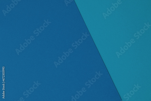 Paper background in two-tone blue colors. Blue tone background from craft paper texture