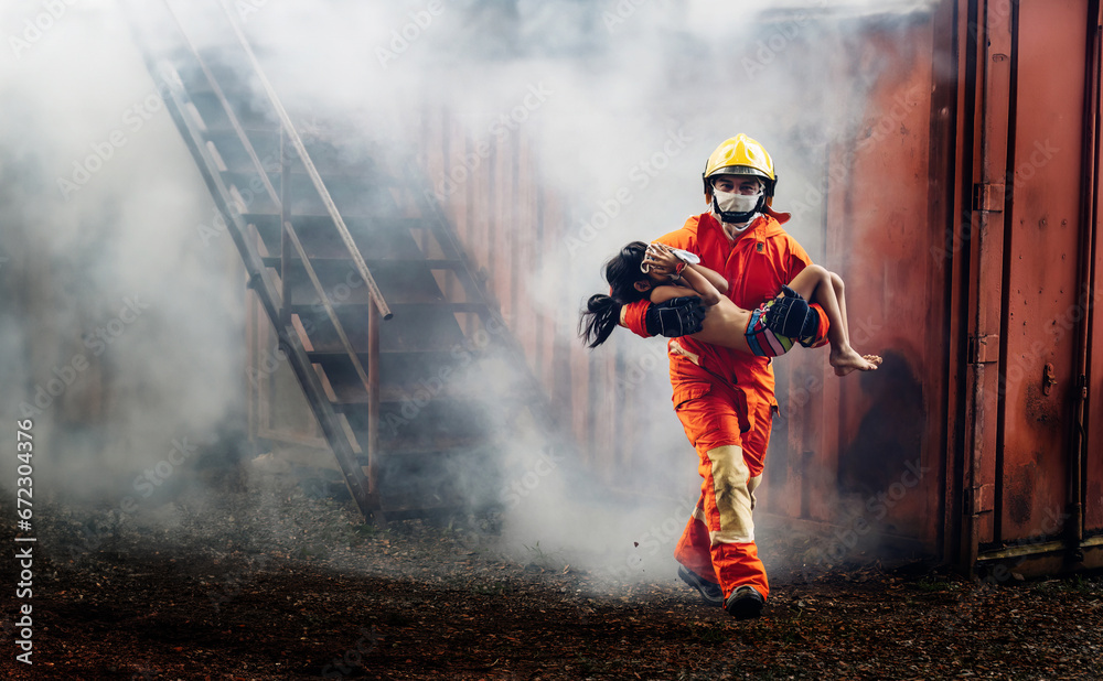 Firefighter to save girl in fire and smoke. Rescue Team or Firefighters save lives people from fire. Firefighter or Emergency team rescue saving life people from fire. Firefighter to save girl in fire and smoke. Rescue Team or Firefighters save lives people from fire. Firefighter or Emergency team rescue saving life people from fire.