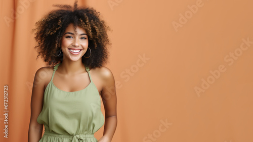 Afro-american woman model wearing a green sundress isolated on pastel