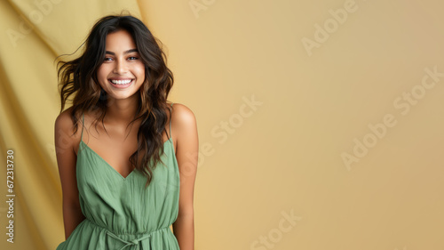 Indian woman model wear green sundress isolated on pastel background