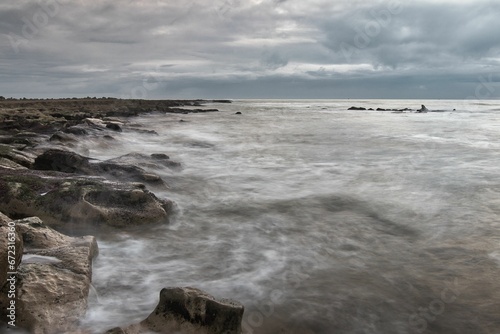 Scenic view of a beach shoreline in the daytime