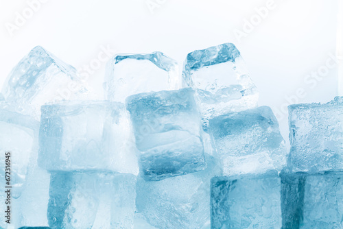 Close-up of ice cubes isolated on white background,Stack of compact ice cubes in blue color isolated on white background.