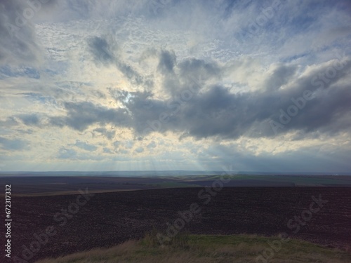 A cloudy sky over a field