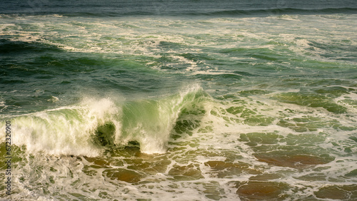 Green ocean with waves