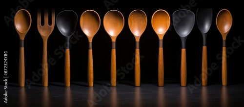 a collection of kitchen ladles