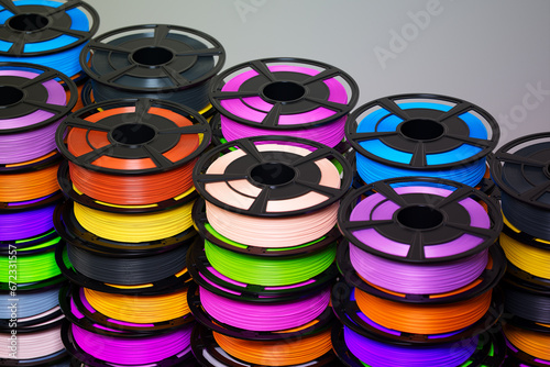 Obraz na płótnie Multicoloured filaments spools of plastic for 3D printer. 3D printing technology w salonie