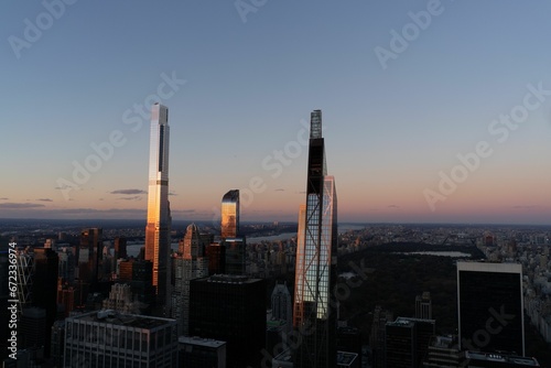 Aerial view of a Rockefeller Center in New York with skyscrapers at sunset