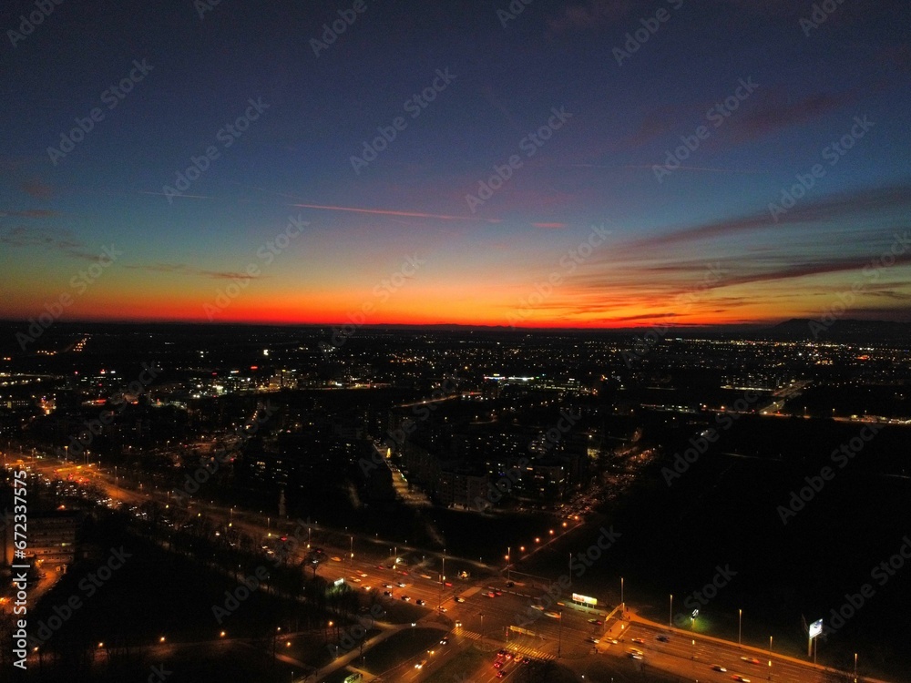Aerial view of sunset over the bustling city