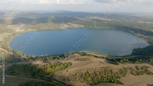 Aerial view of Lake Martignano, originally called Lake Alsietino. It is an endorheic lake of volcanic origin located in Lazio, Italy. photo
