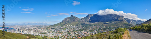 City landscape near mountains with a cloudy blue sky background on a sunny summer day. Beautiful cityscape of Cape Town, South Africa as a travel vacation or holiday destination in a coastal location
