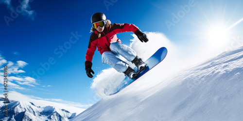 Young, cute woman snowboarding fast with motion blur effect.