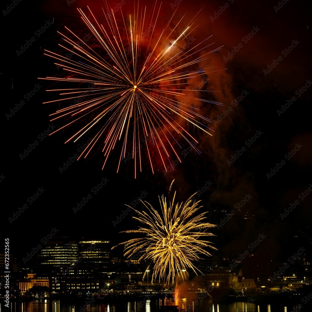 a fireworks display in the middle of a body of water