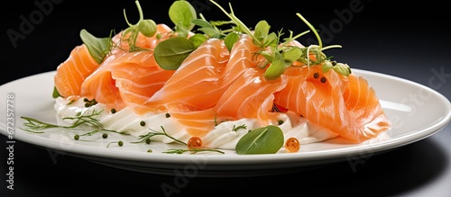 Appetizer starter featuring salmon that has been cured and prepared with smoke